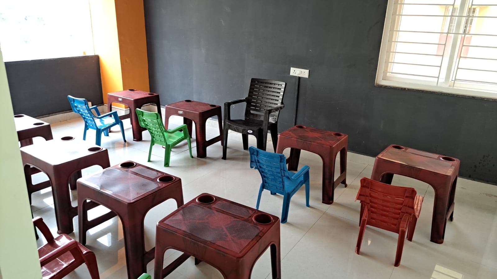 Activity classroom with safe tables and chairs for early learning
